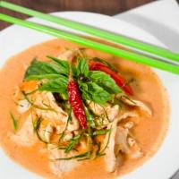 Panang Curry · Spicy panang curry with coconut milk, bell peppers, and sweet basil.