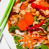 Cashew Chicken · Stir-fried chicken with cashew nuts, onions, bell peppers, mushrooms, carrots, celery, and c...