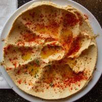Hummus Appetizer · A Puree of cooked chickpeas sesame sauce lemon juice garlic olive oil and pita