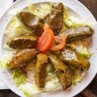 Grape Leaves · 7 grape leaves stuffed with rice tomato parsley lemon juice and a blend of spices
