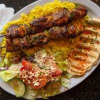 Lamb Kabob · Tender lamb cubes on skewer marinated with tomato sauce, special spices, olive oil, and oreg...