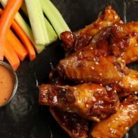 Korean Bbq Wings (8 Pcs) · Mild heat. 8 Korean BBQ wings, served with carrots and celery and a choice of classic ranch ...