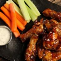 Teriyaki Wings (8 Pcs) · Mild heat. 8 teriyaki smoked and grilled wings (mild heat), served with carrots and celery a...