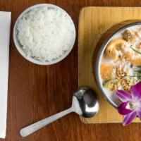 Panang Curry Chicken (Gf) · The richest of them all. Chunks of chicken sauteed in spices and simmered in a peanut-based ...