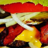 The Everything Burger Combo · 1/2 lb Ground Beef topped with Ketchup, Mustard, Mayonnaise, Hickory Smoked Bacon, American ...