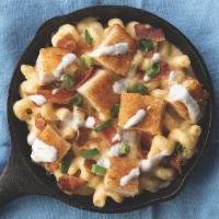 Chicken Bacon Ranch · A bed of cavatappi pasta with crispy chicken, applewood smoked bacon, shredded cheese, and a...