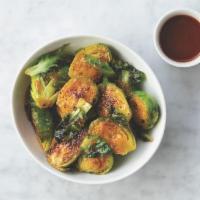Honey Sriracha Brussels Sprouts · Roasted brussel sprouts with honey sriracha sauce.