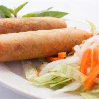 Fried Egg Rolls (4) / Cha Gio · Crispy, filled Vietnamese egg rolls filled with ground pork and vegetables served with house...