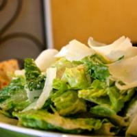 Caesar Salad · Romaine, Shaved Parmean, Focaccia, House made Caesar dressing. Dressing comes on the side.