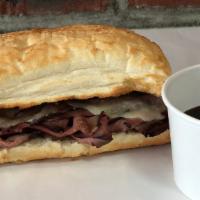 Regular French Dip Sub Sandwich · Lean Roast Beef sliced thin, provolone cheese and steaming Au Jus.