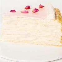 Slice Rose Mille Crepe · Paper-thin handmade crepes layered with rose flavoured pastry cream, garnished with sweet ro...