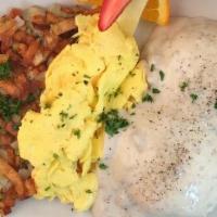 Sausage Gravy, Buttermilk Biscuits & Eggs · two eggs any style, hash brown potatoes  (contain green onions)