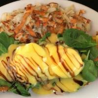 Avoveggie-N-Eggs Benedict · avocado mashed on english muffin. grilled tomato, spinach, poached eggs, hollandaise, aged-b...