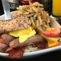 3 Little Pigs Bagel · Plain or Everything bagel served with bacon, ham, banger sausage (contains gluten), 2 eggs s...