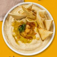 Hummus Plate · A mixture of mashed garbanzo beans, tahini, and olive oil served with pita bread.