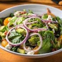 Wells Street Salad · Mixed greens, mandarin oranges, avocado, bacon bits, onions, Gorgonzola and our lemon poppy ...