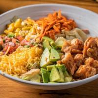 Crispy Chicken Salad · Iceburg, crispy chicken, pico de gallo, corn, cheddar cheese, avocado, tortilla strips & chi...