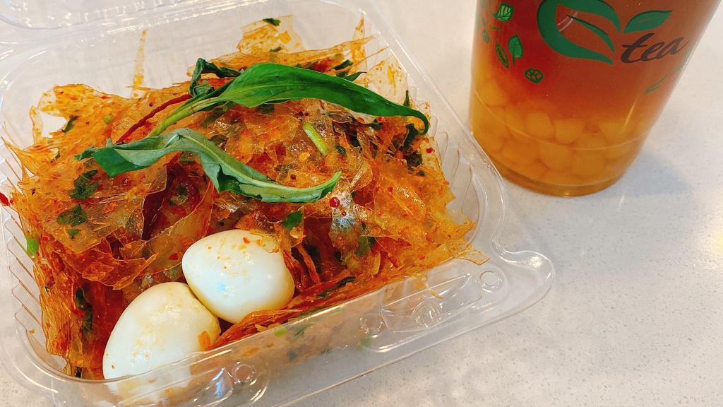 Rice Paper Salad (Banh Trang Tron) · Rice Paper with sour mango, quail eggs, and shrimp salts