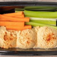 Hummus Platter · 3 scoops of our firm and oil-free hummus served cold with carrots and celery. Add side of to...