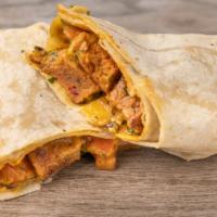 Carne Asada Burrito · Carne asada seitan, chile sauce, chee sauce, guacamole, pico de gallo.