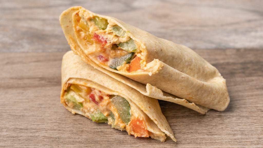 Veggie And Hummus Wrap · Hummus and raw veggies: thin sliced carrot, tomato, roasted red pepper, mixed greens, cucumber.