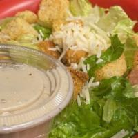 Caesar Salad · Romaine Lettuce, Croutons, Sliced Parmesan Cheese served with Creamy Caesar Dressing.