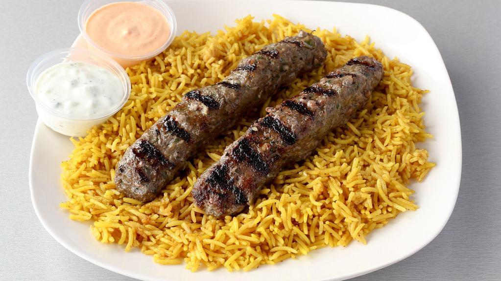 Kafta Kebob Platter · Two skewers of grilled Kafta meat (ground beef); Served over a bed of rice, pick a side and sauce to complete the meal.
