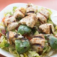 Chicken Kebob Salad · Fire grilled chicken served over romaine, tomato, cucumber, onion, parsley, house garlic vin...