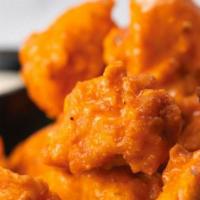 Boneless Wings · Half-pound of tender, boneless chicken wings, individually cut and hand-breaded right here, ...