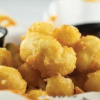 Wisconsin World Famous Cheese Curds · From the cheese curd capital of the world to your mouth! Large curds of cheese, hand-dipped ...