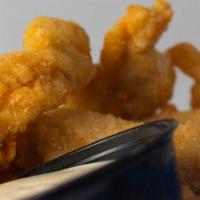 Chicken Tender Strips · All white meat chicken fresh-cut and handbreaded to order then fried golden brown with a sid...