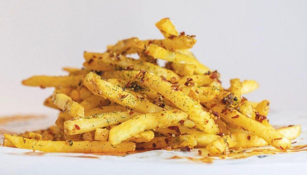 Firecracker Fries · An addiction prediction; a basket of fries tossed in a light garlic sauce with a trifecta of pepper; cracked black, crushed red and white pepper, then dusted with dill, grated parmesan, and more seasoning. Served with peppercorn ranch.