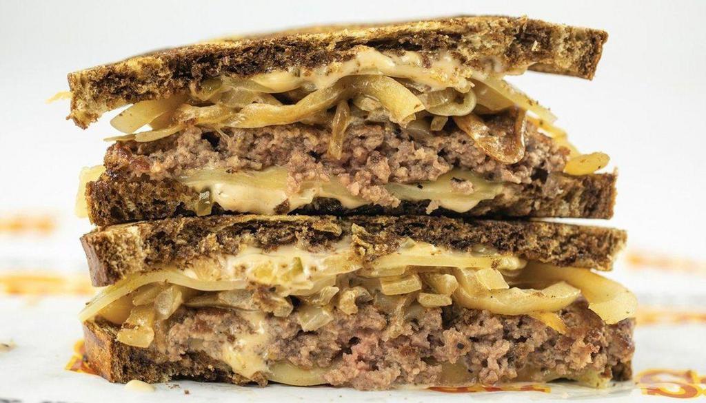Brothers Good-N-Ugly Stacked Patty Melt · Can something this ugly be loved by so many? Yep. Our seasoned three-blend beef, hand-pressed between slices of grilled marble rye bread with swiss, yellow grilled onion and thousand island. If you're a true-to-form patty melt fan, you won't be disappointed!