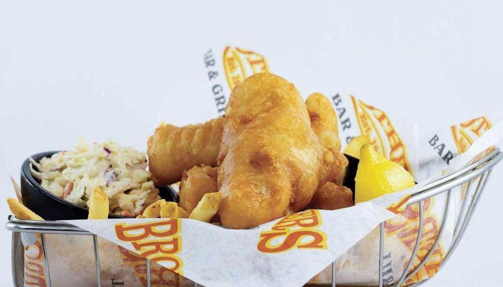 Beer Battered Cod Fish Fry · Half-pound of cod fillets dipped in our own Wisconsin beer batter, fried until golden brown, and served on a bed of french fries, coleslaw and tartar sauce.