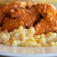 Buffalo Chicken Mac 'N Cheese · Two american favorites in a bowl. Mac 'n cheese (five cheeses) topped with boneless buffalo ...