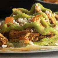 Chicken Tinga Street Tacos · Two street-style soft corn tortilla tacos with chicken tinga, yellow onions, avocado aioli, ...