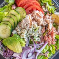 Cobb Salad · Mixed greens and romaine, turkey, bacon, avocado, Gorgonzola cheese, cucumber, tomato, onion...