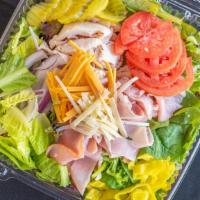 Chef'S Salad · Mixed greens and romaine, ham, turkey, tomato, American and Swiss cheese, onions, peppers an...