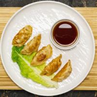 Gyoza (5 Pieces) · Pork dumplings cooked to perfection. Served with dipping sauce