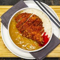 Tonkatsu Curry · Made with pork cutlet, potatoes, carrots and onions. Served with rice
