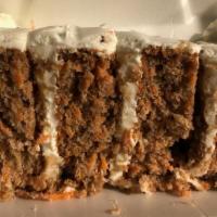 Carrot Cake · Carrot Cake iced and filled with whipped cream cheese icing and topped with walnuts.  Perfec...