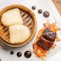 Pork Belly Bao Buns · (2pc) Pork Belly Bao Buns, Sesame-Honey Glaze, Pickled Vegetables
