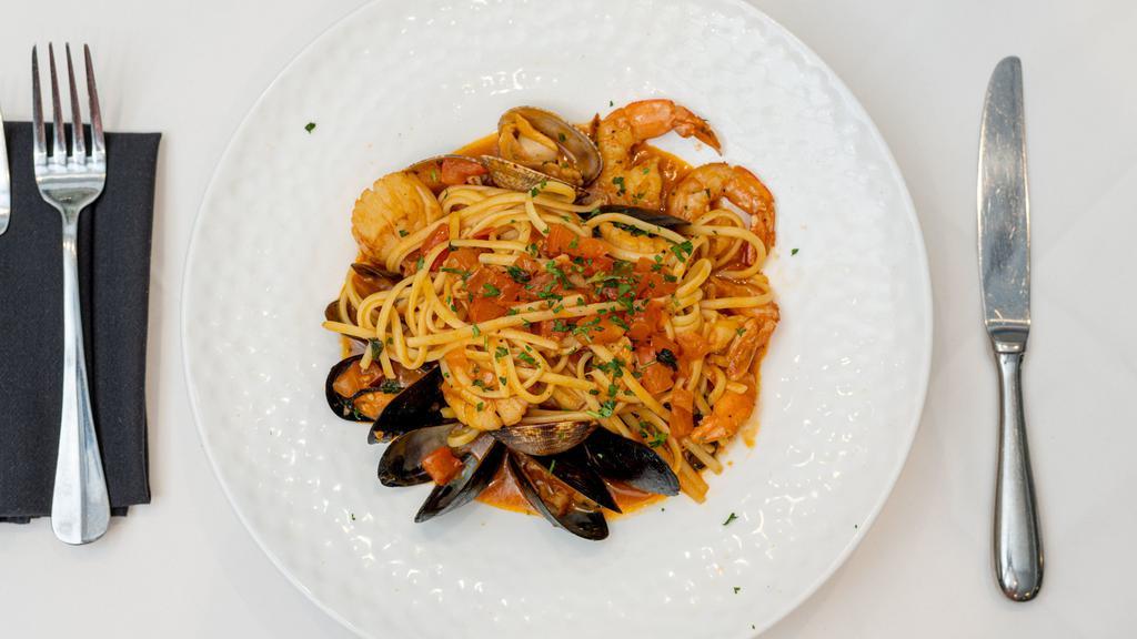 Linguine Mare · Thin flat long pasta with scallops, shrimp, Manila clams, mussels, garlic and fresh tomatoes; finished with a light marinara sauce.
