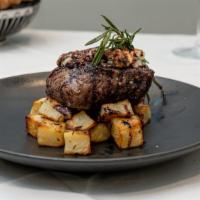 Agnello Alla Brace · 8 oz Double Colorado Lamb chops grilled, served with roasted potatoes