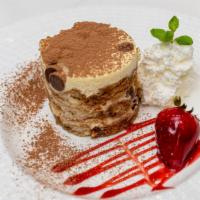 Tiramisu · Espresso soaked ladyfingers layered with mascarpone cream and chocolate chips