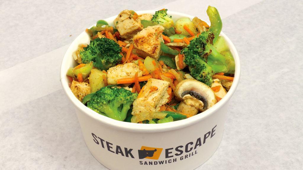 Cajun Chicken Bowl · Grilled chicken, oven roasted broccoli and carrots, grilled onions, mushrooms, green pepper, and Cajun seasonings.