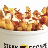 Totally Loaded Fries · Regular. Fresh-cut fries topped with crispy bacon, smothered with melted Cheese sauce and ra...