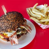 The Killer Tomato Burger · American cheese, bacon, grilled onions, grilled tomato, killer diller cult sauce on a black ...