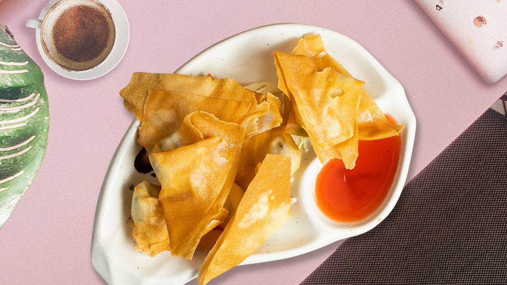 Flamin' Wontons · Spicy cream cheese and chicken