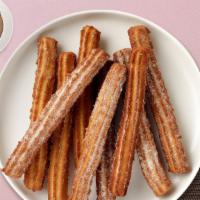 Bavarian Chream Churros · This sensation is well worth all the hype. It's two freshly baked, cinnamon sugar-dusted chu...